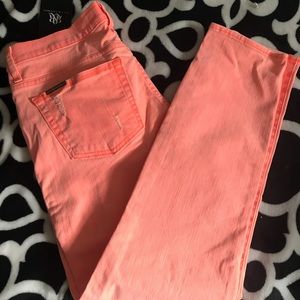 Stylish bright orange jeans